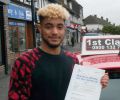 Natham with Driving test pass certificate